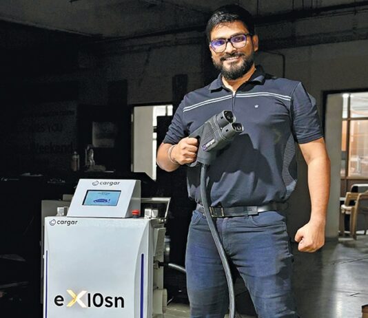 Raj Anupam, Co-founder, MCS Cargar with India’s first portable flexible DC fast charger